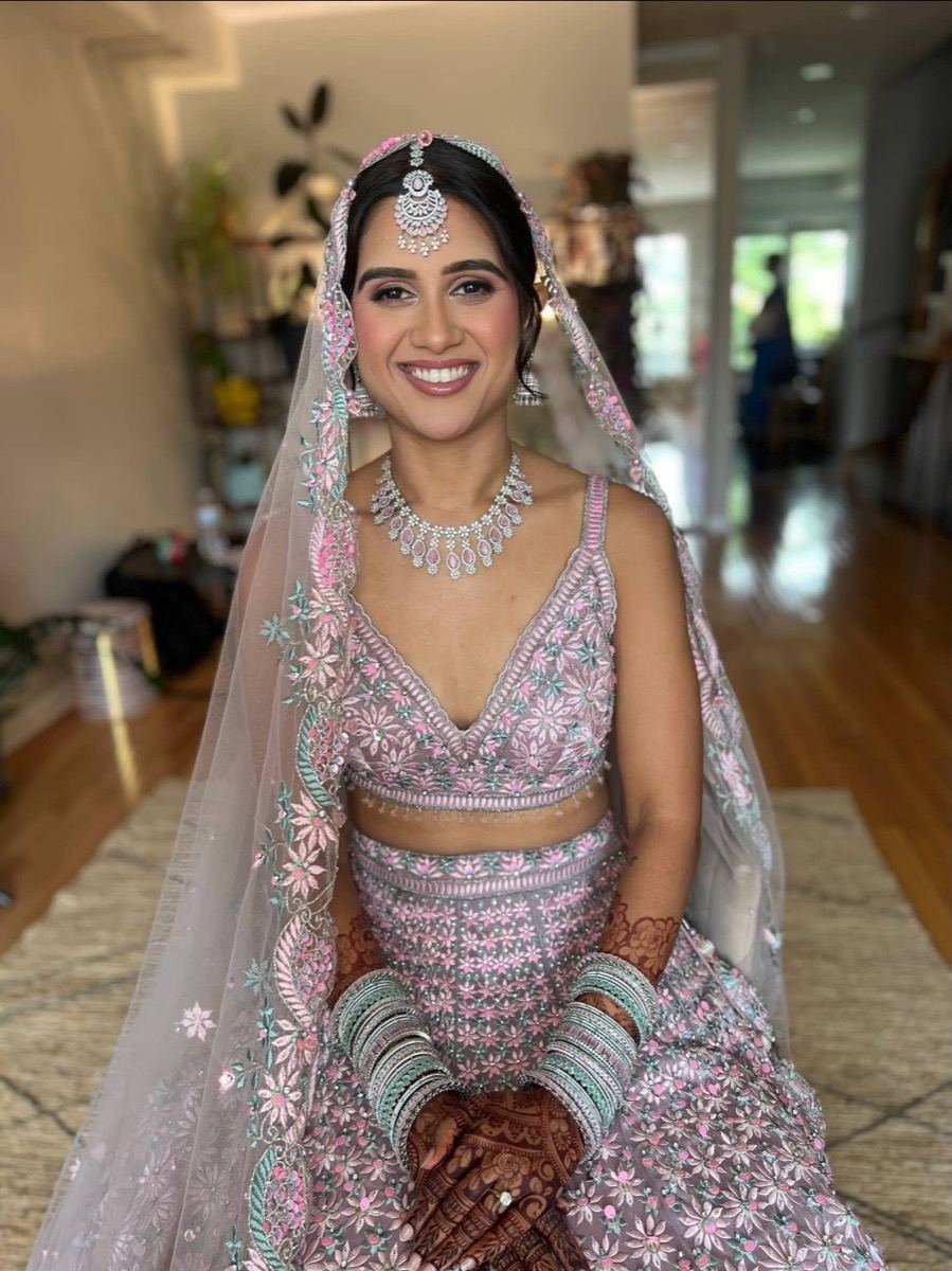 Pink bridal lehenga makeup look by Simran Khurana