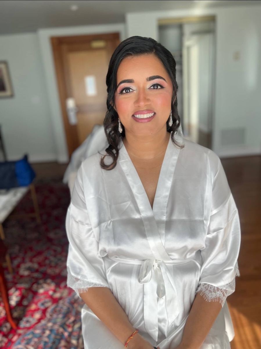 Soft bridal glam makeup in white robe